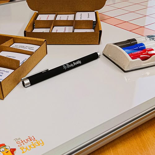 Editable study flashcards, Study Buddy branded pen, whiteboard with study tools, educational resources for effective learning, The Study Buddy website supports students with custom study aids and organisational tools to enhance academic success.