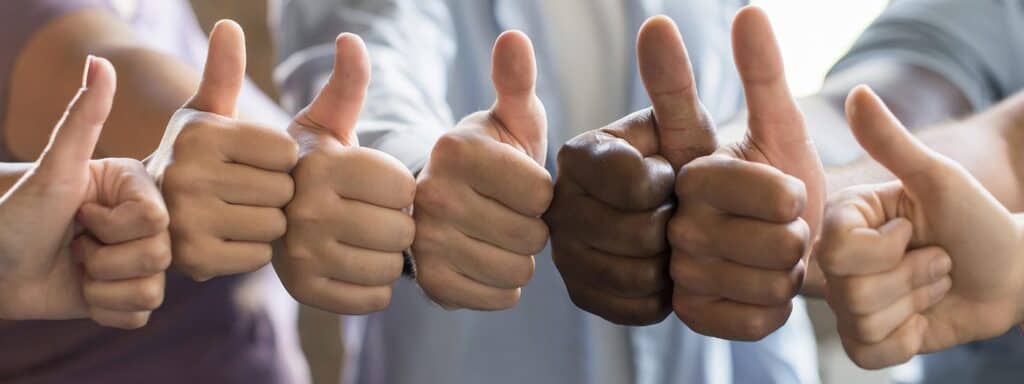 Thumbs-up hands showing support and positivity, representing The Study Buddy website's commitment to academic success and motivational learning tools.