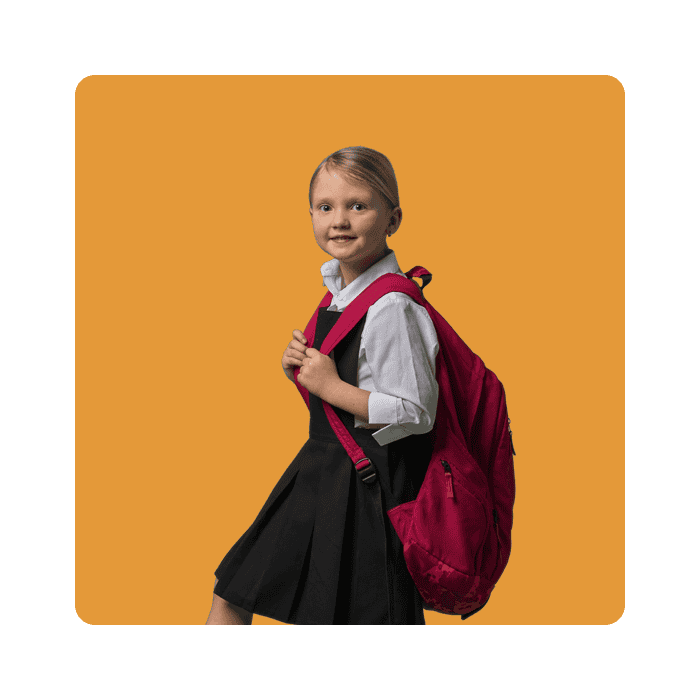 Back-to-school young girl with a pink backpack, ready for learning, illustrating the educational support provided by The Study Buddy website.